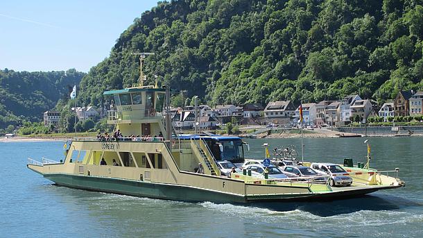 A Ferry crossing the river rhine
