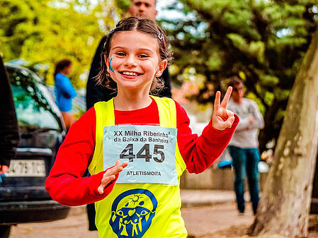 Graphic of a child, who is running for donations.