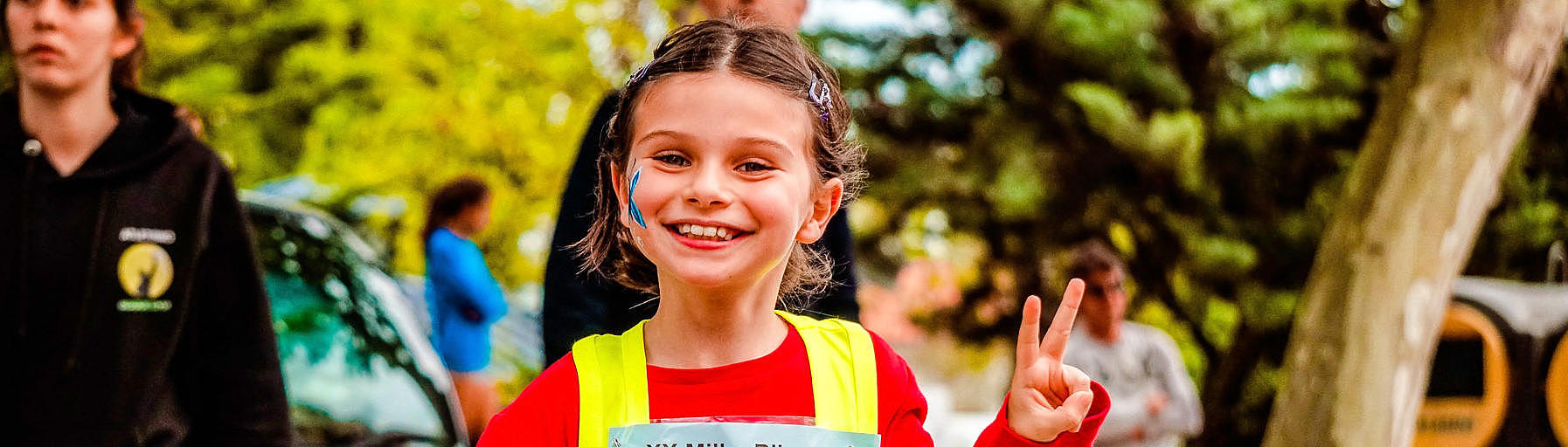 Graphic of a child, who is running for donations.