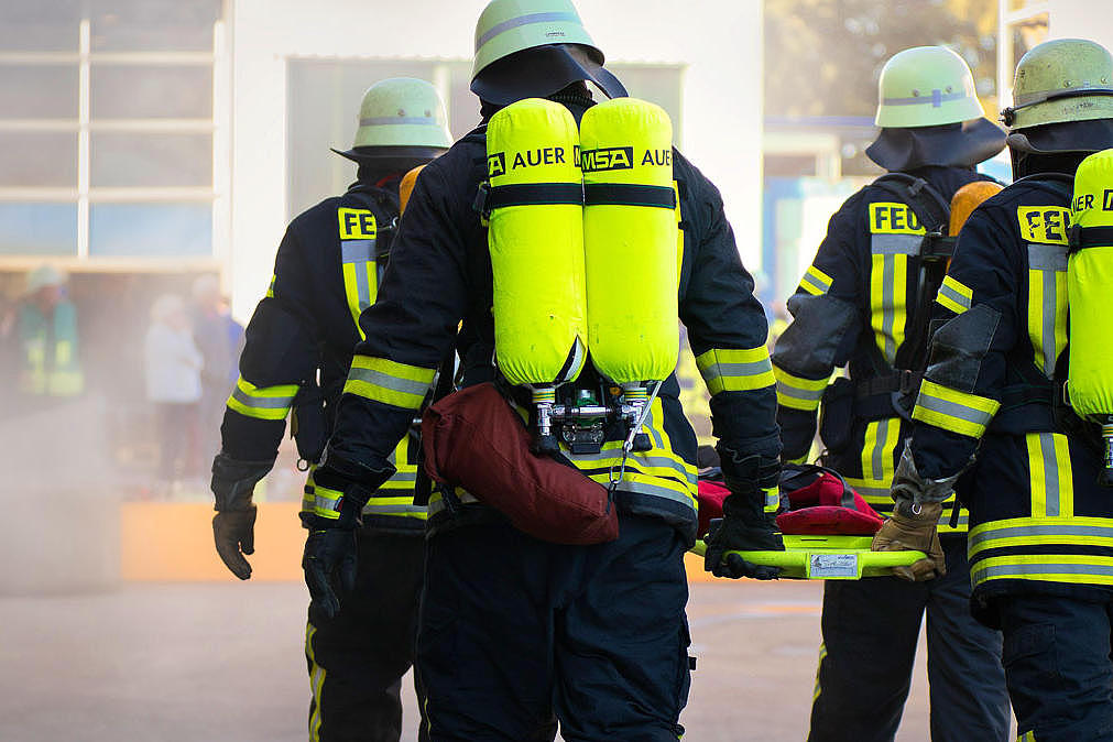 Four firefighters at work.