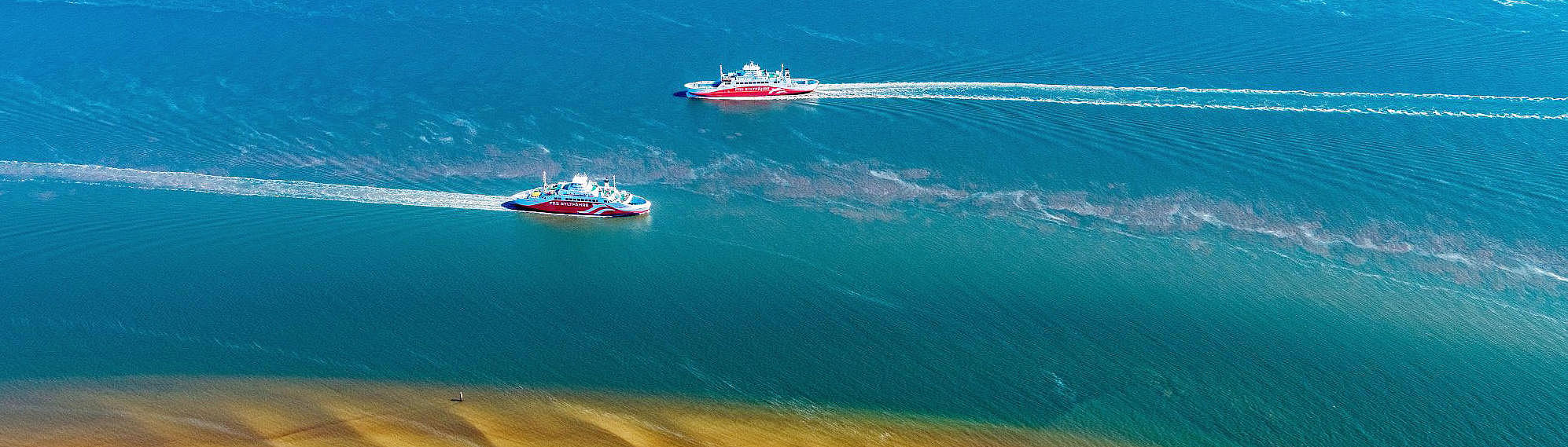 The FRS Syltfaehren on the sea with water.