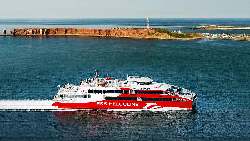 The Halunder Jet from starboard in front of the island of Heligoland.
