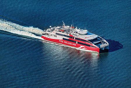 Vessel Halunder Jet sails through the sea.