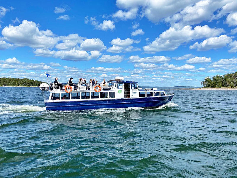 The MS "Okeanos" on the water at blue sky.