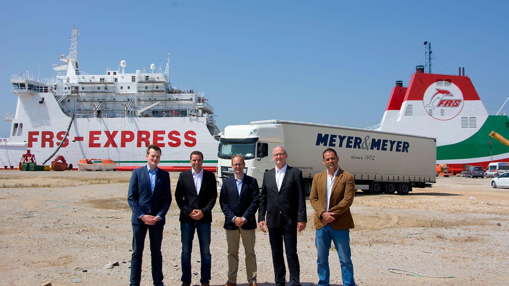 FRS and Meyer & Meyer representatives in front of the Al Alandus Express.