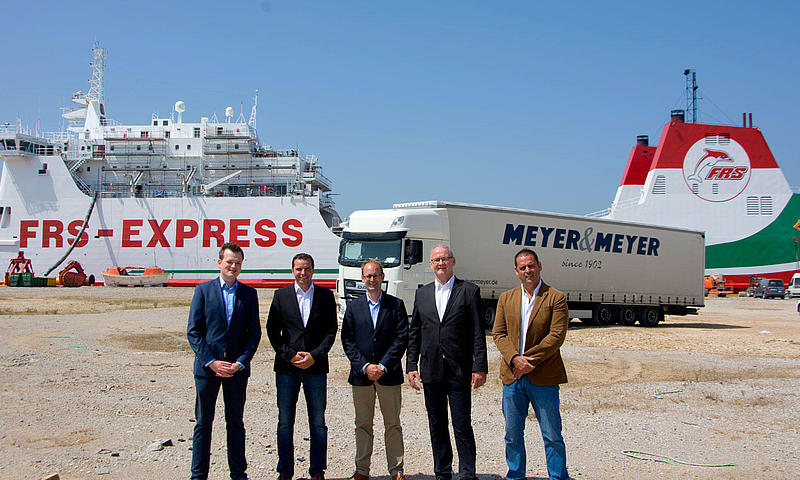 FRS and Meyer & Meyer representatives in front of the Al Alandus Express.