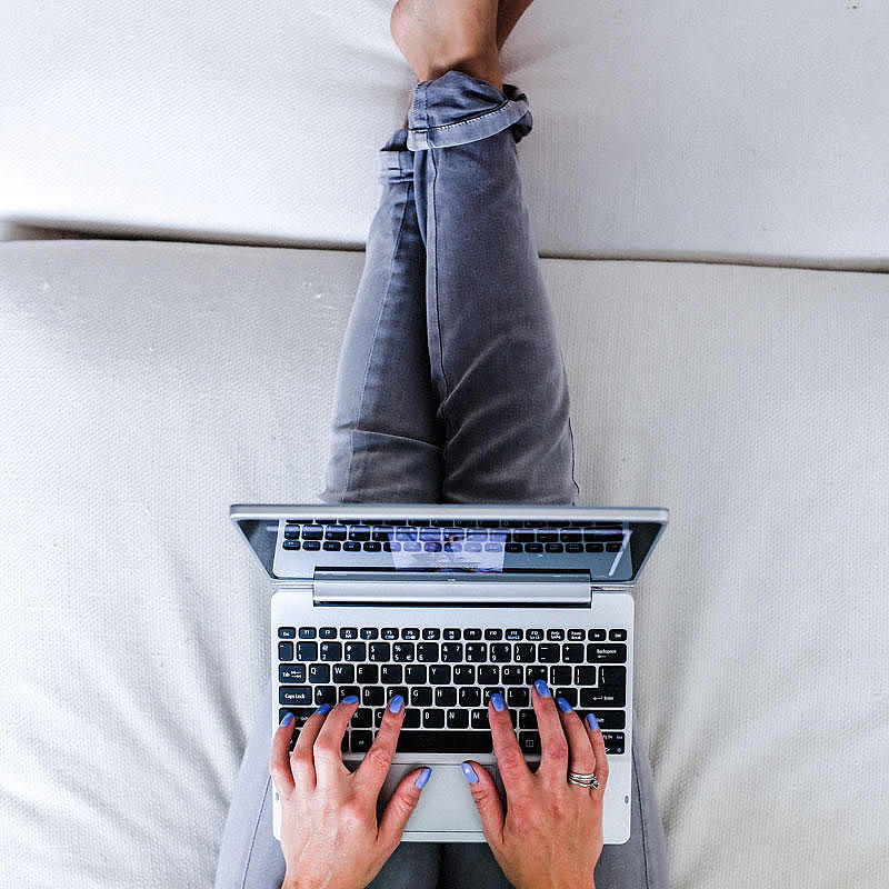 a woman working on a notebook