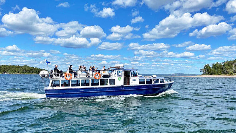 The MS "Okeanos" on the water at blue sky.