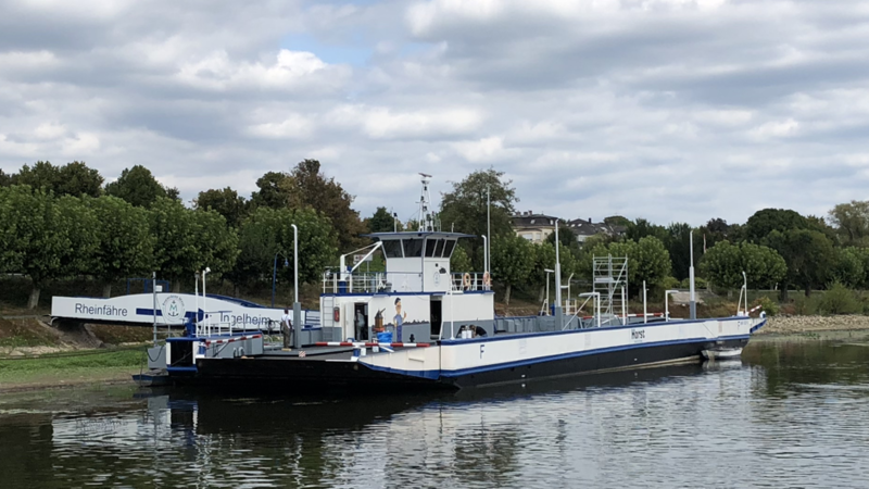 A ferry anchors on the river Rhine