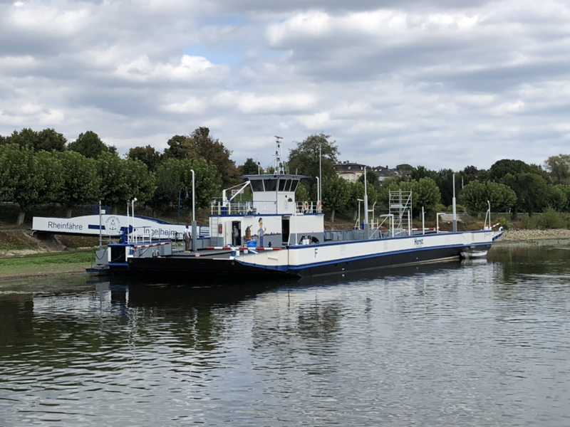 A ferry anchors on the river Rhine
